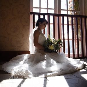 Beaded Lace Wedding Dress with Illusion Neckline & Intricate Floral Embroidery.